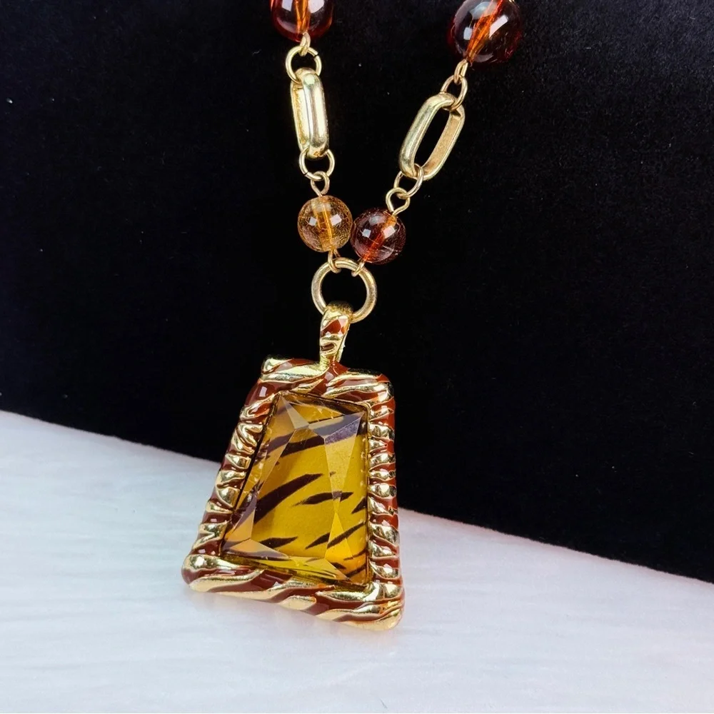 Beautiful, bohemian chic, dressy, animal, print pendant costume necklace